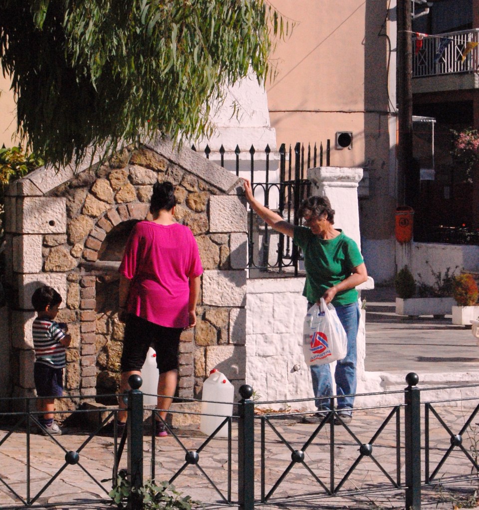 Enjoying fresh spring water in Kinopiastes